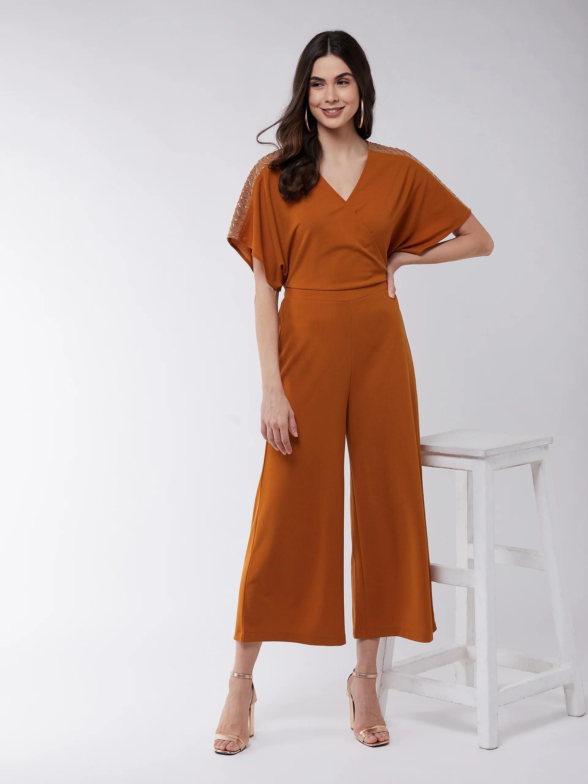 PANNKH Mustard Solid Overlap Embellished Jumpsuit